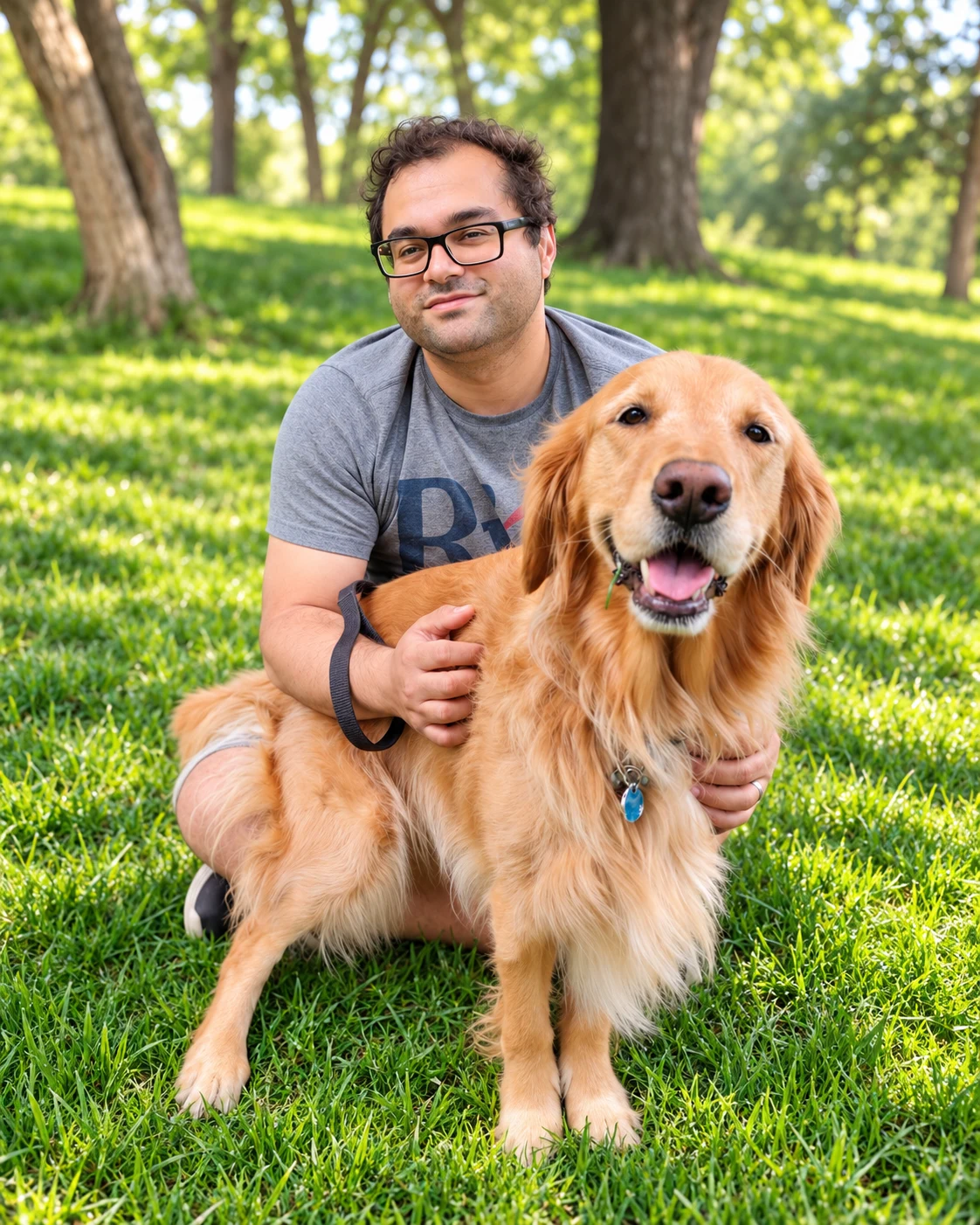 Senator in the grass beside a person kneeling in a sunny park.
